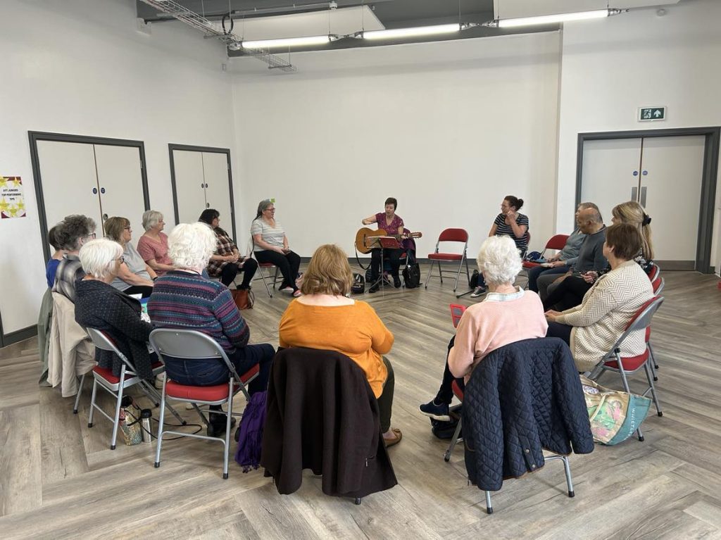 Participants taking part in Albany Sings community singing workshop at Inspire Studio, The Albany Theatre Coventry